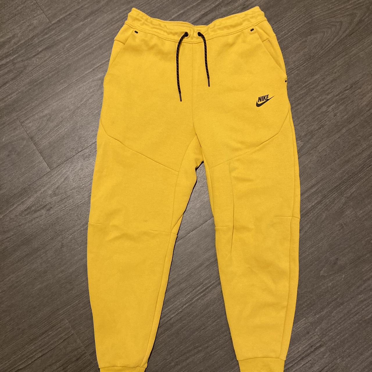 yellow nike tech fleece shorts
