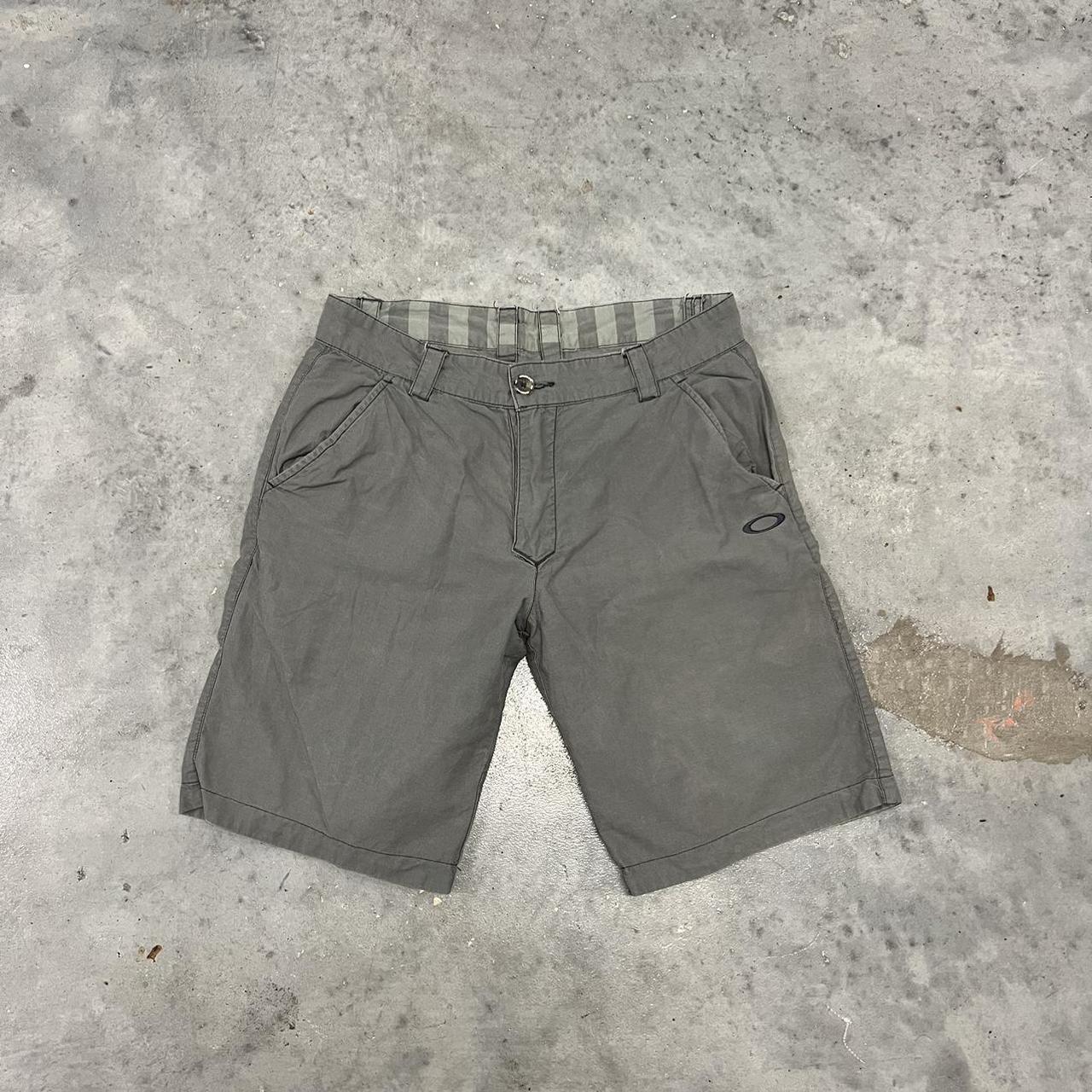 Y2k Oakley shorts that are reversible with the...