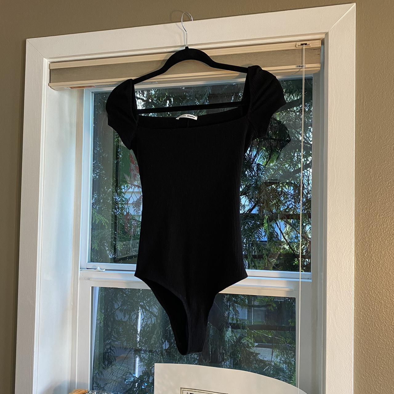 Reformation Women's Black Bodysuit Depop