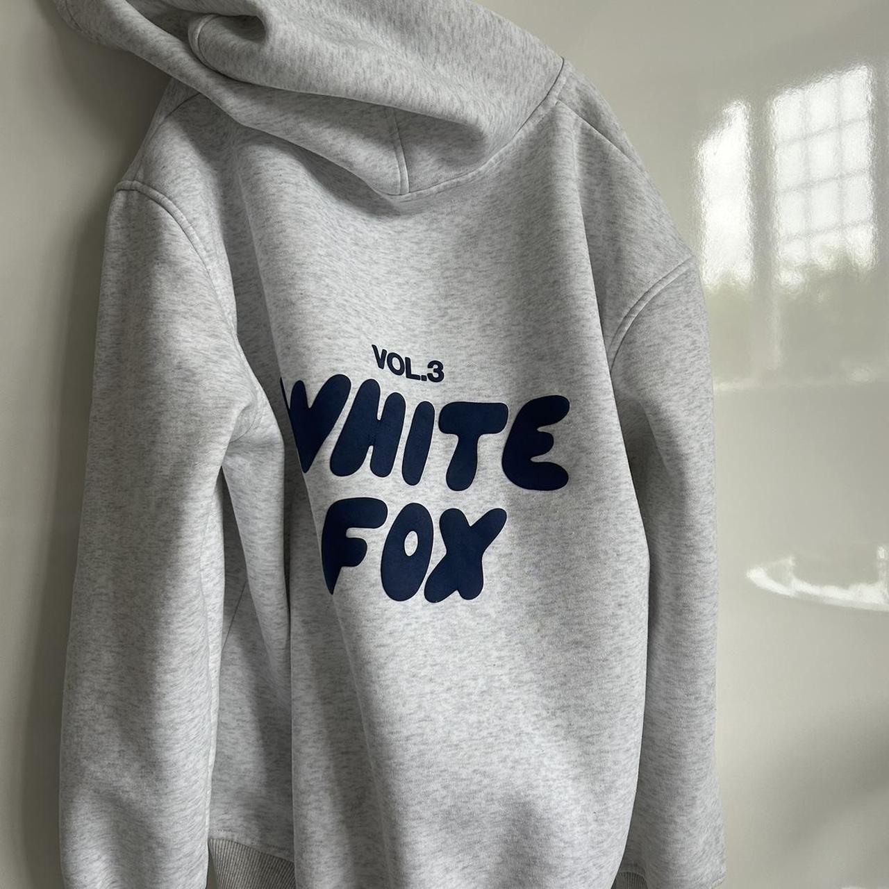 light grey white fox hoodie with navy blue... - Depop