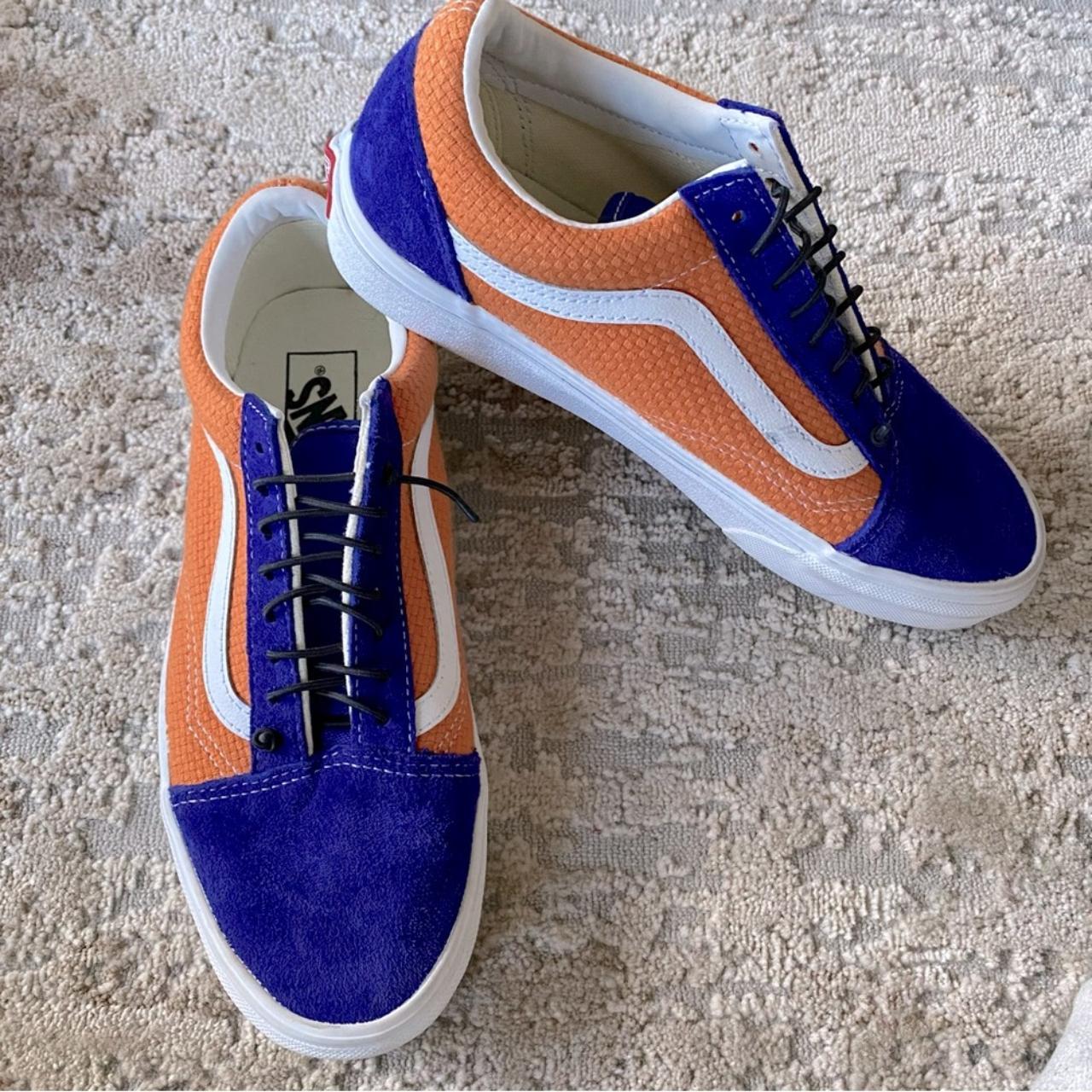 Blue and orange clearance vans