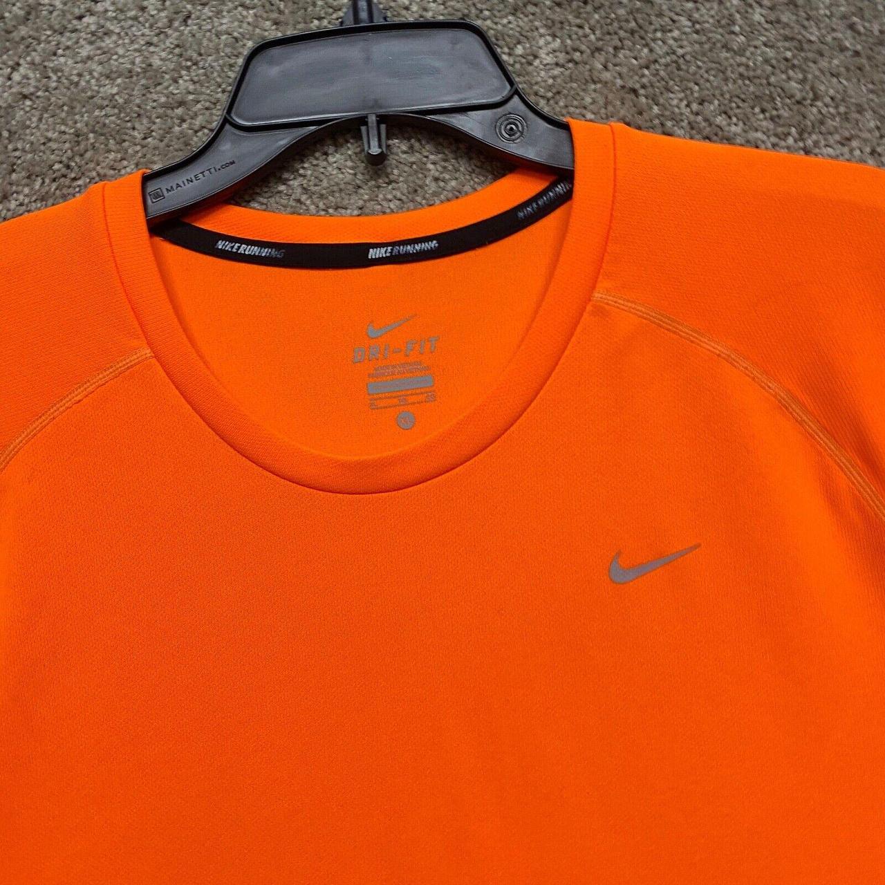 Orange Nike Dri-Fit Orioles t-shirt. The size is an - Depop