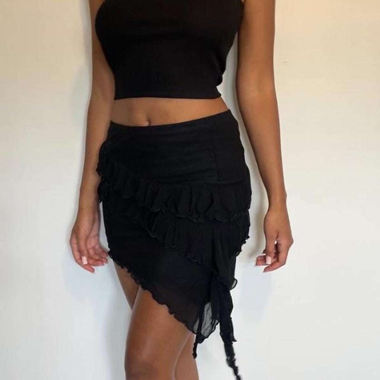 Black mini ruffle skirt Asymmetrical design Model... - Depop