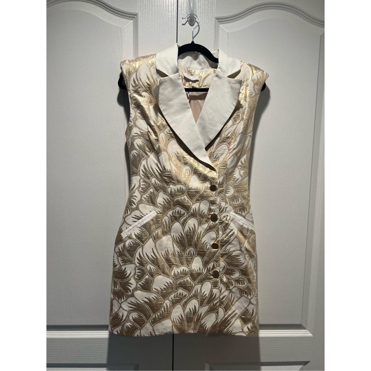 Brocade Cape Sleeve Blazer Dress is made from Depop