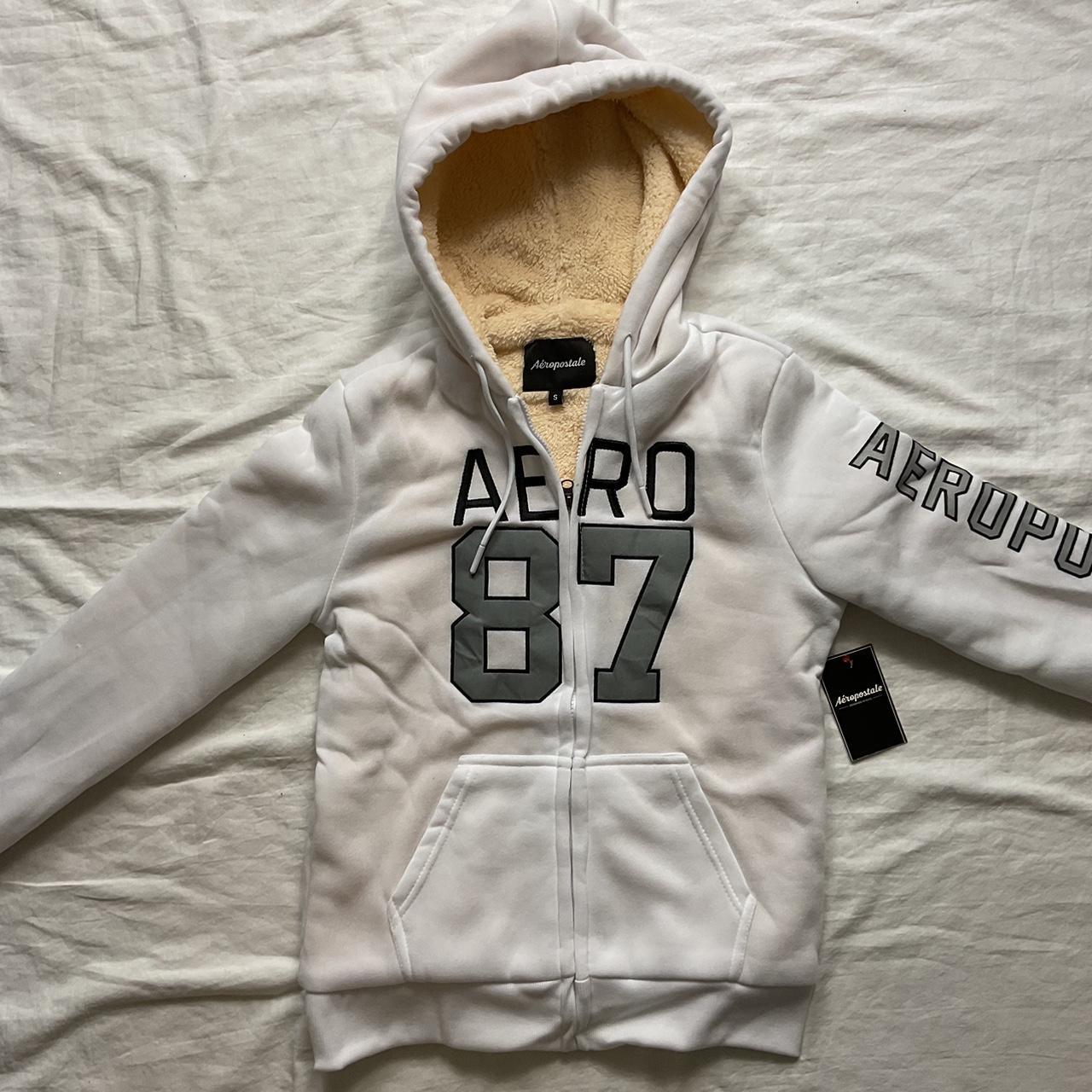 White fleece lined Aeropostale jacket. Retails for