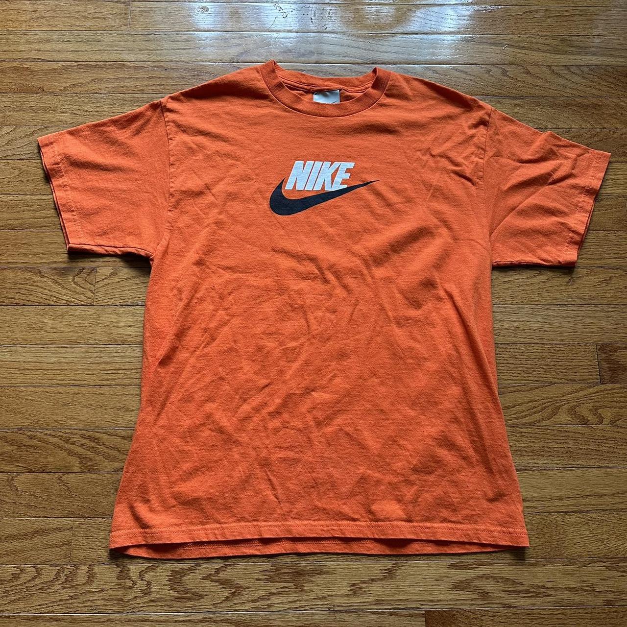 blue orange nike shirt
