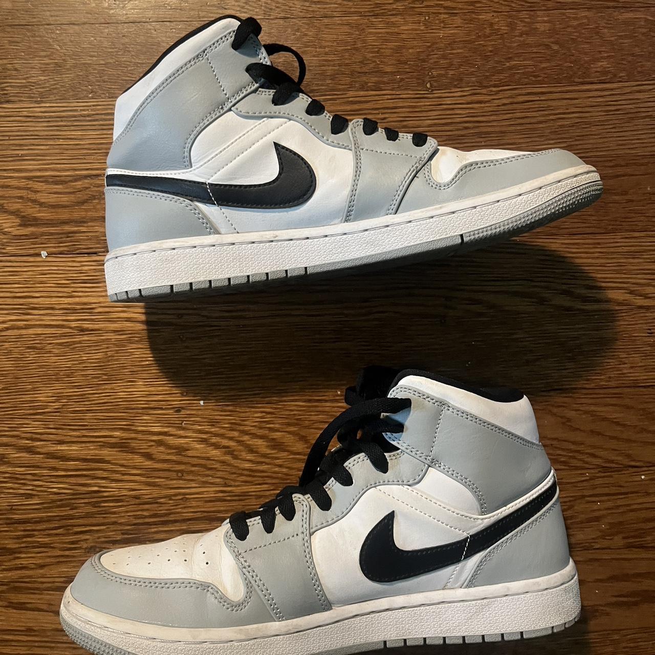 jordan 1s black white and blue