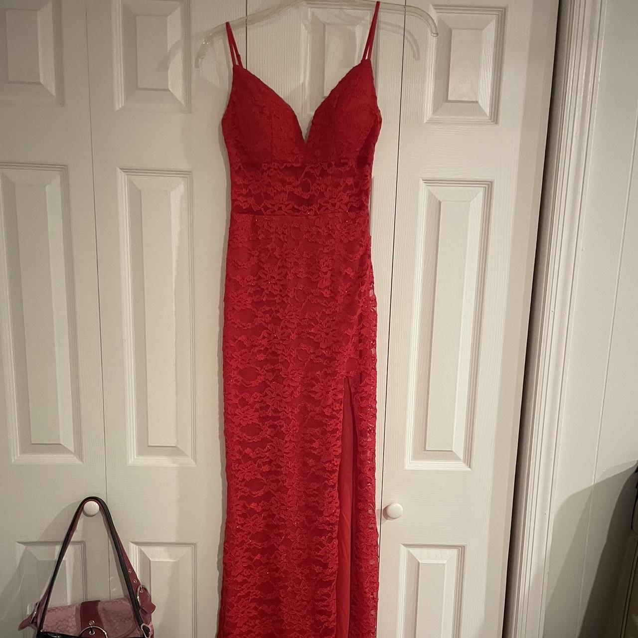 Red lace dress with a slit and a lace band in the... - Depop