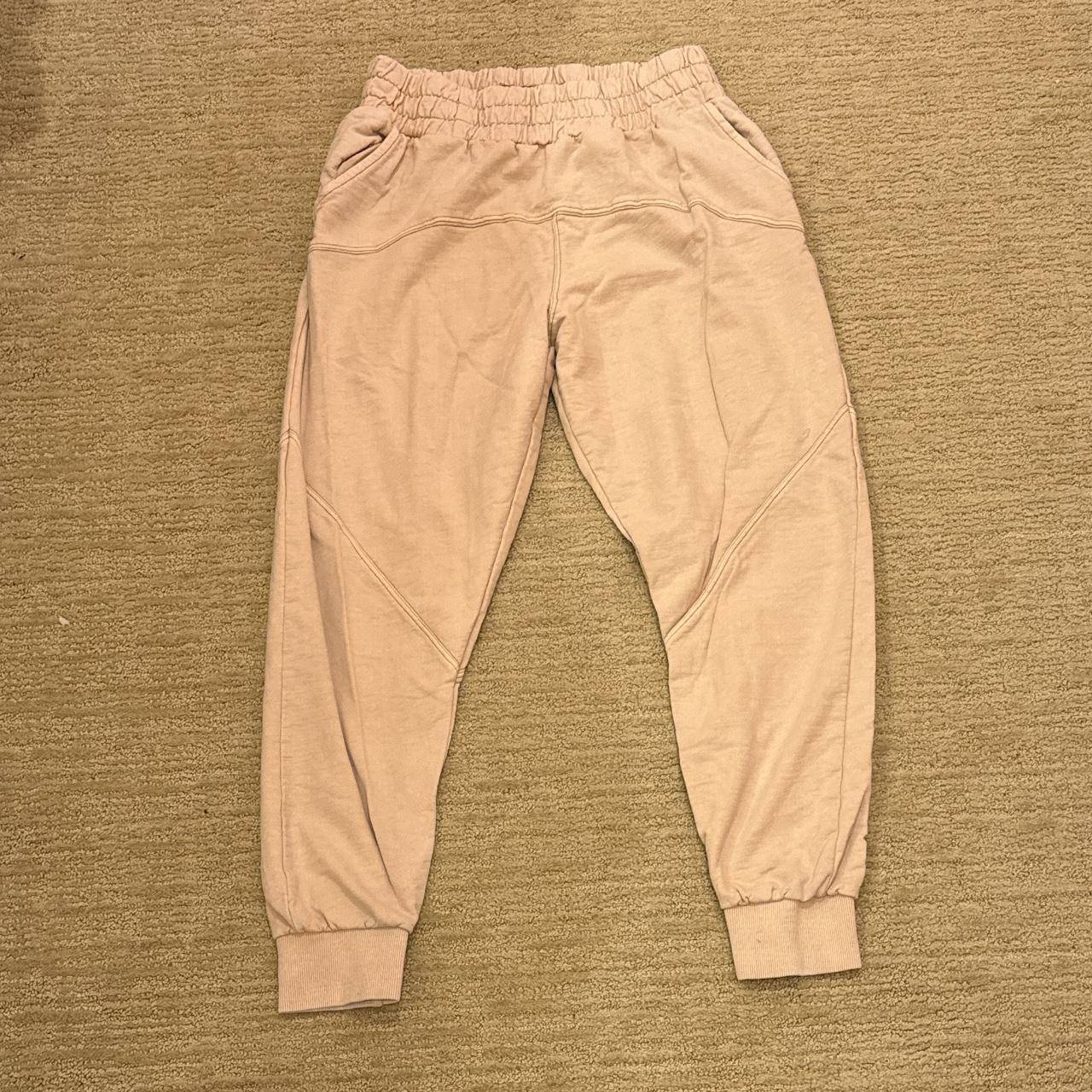 Out from under beige/peach sweat pants - Depop