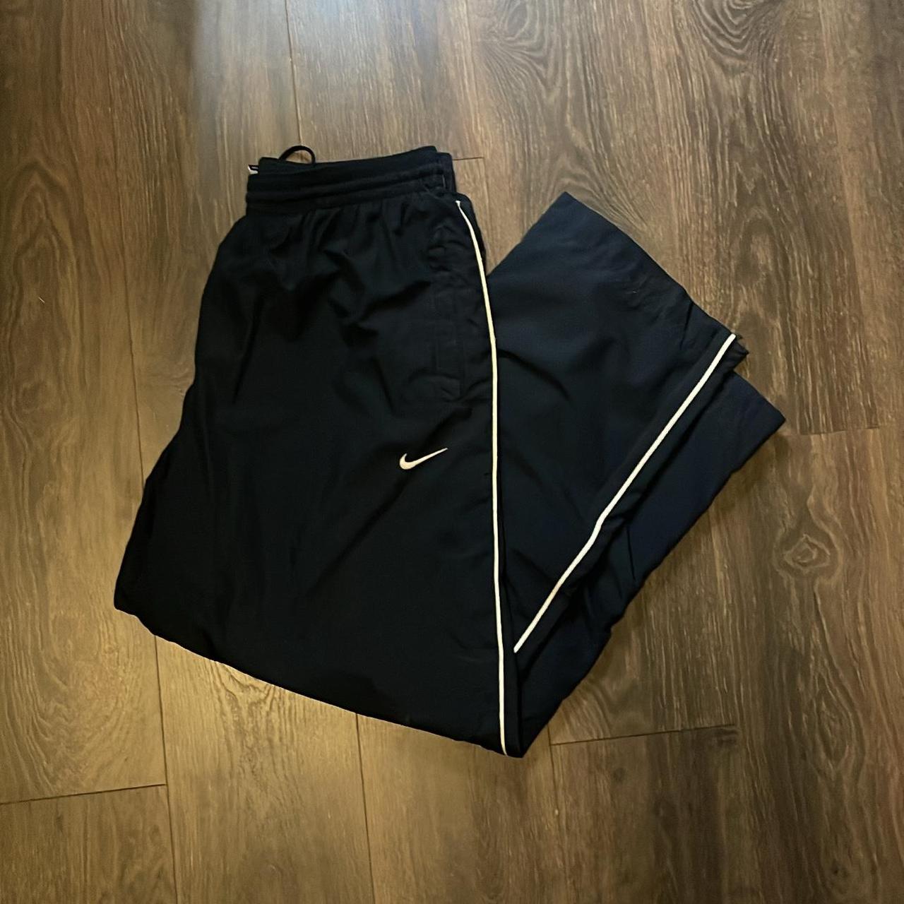 baggy dark blue nike track pants size XL dm me... Depop