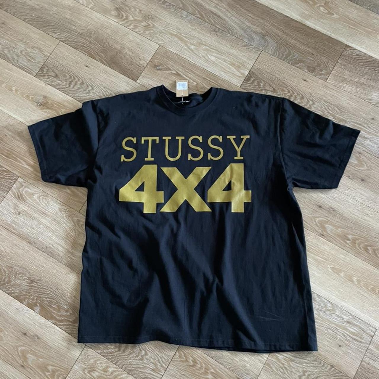 STUSSY 4x4 tee in black size 2XL. Shirt features a... - Depop