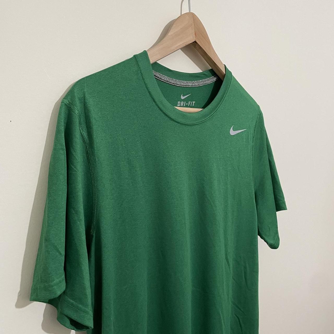 barely green nike shirt