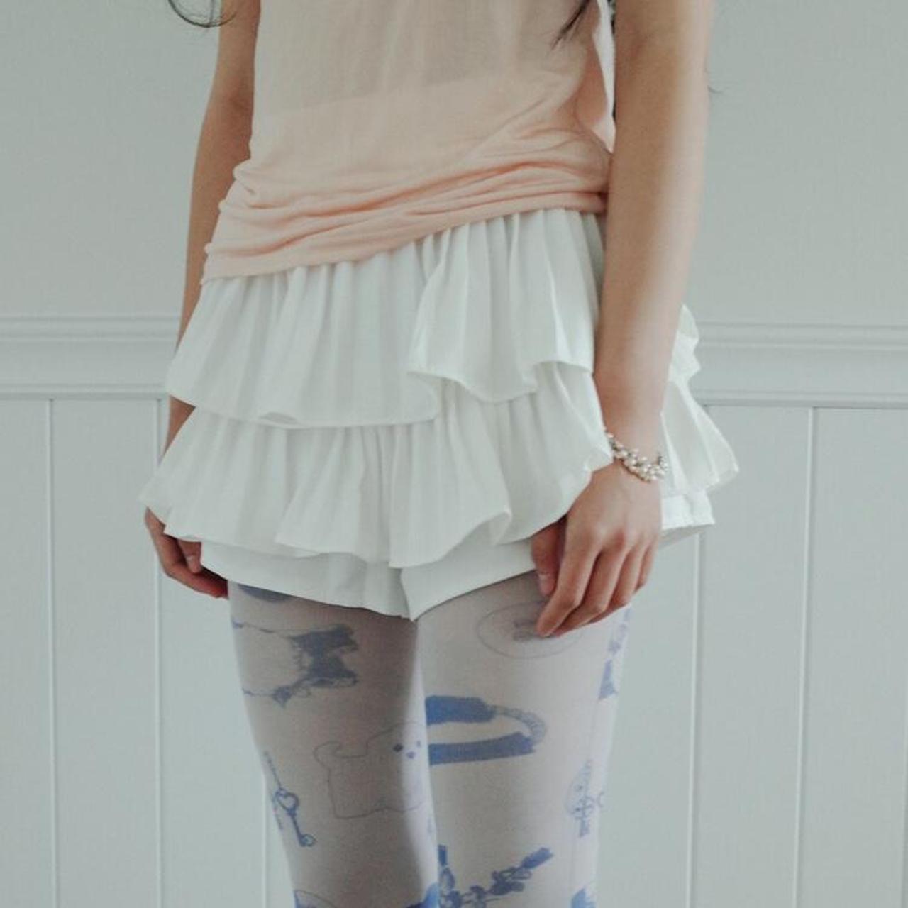Korean white pleated/ruffled skort (price due to... - Depop