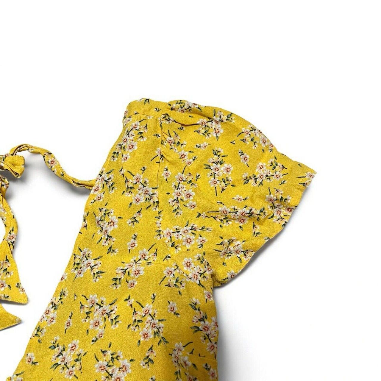 American Eagle romper Size XS Yellow floral wrap. Depop