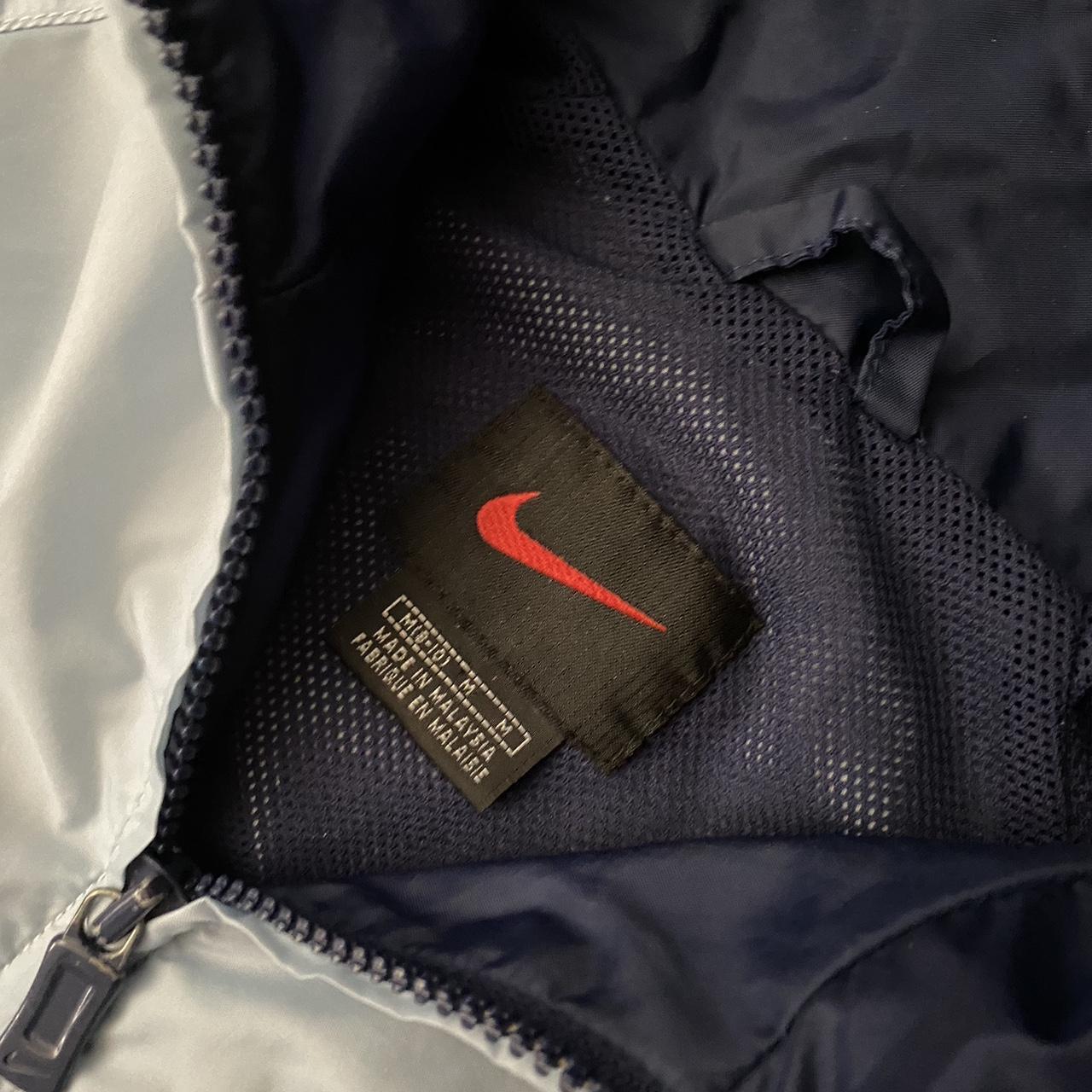 Vintage navy blue and light blue nike jacket In... Depop