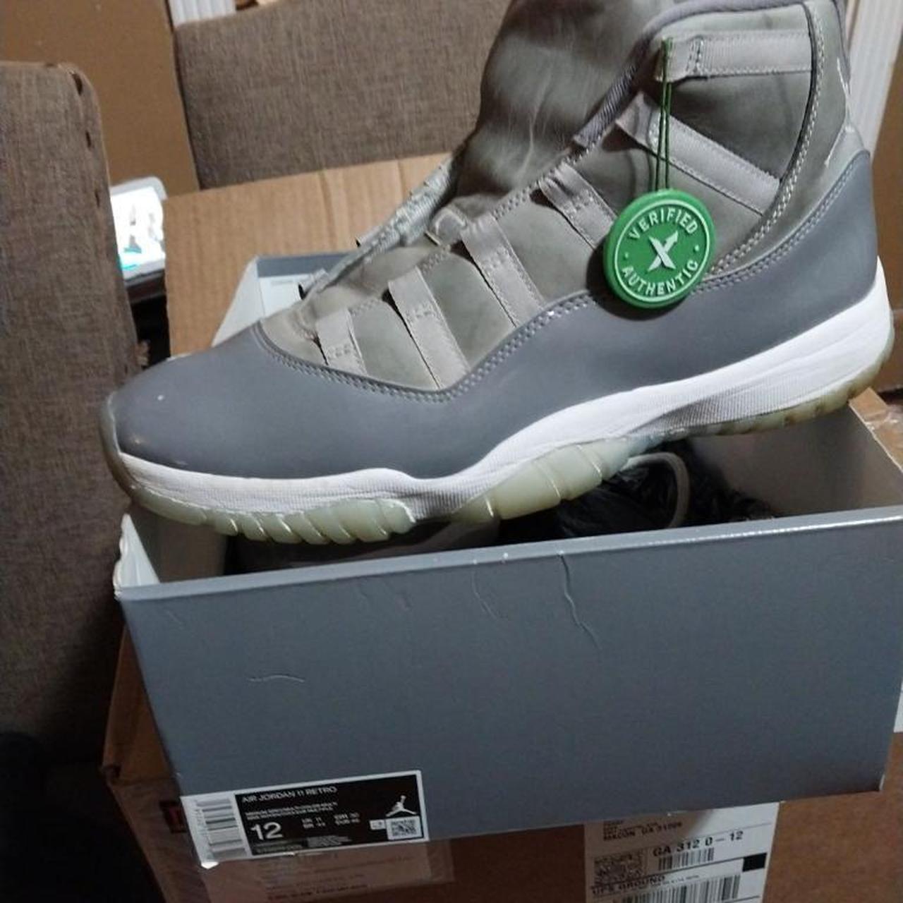 grey and white jordan 11
