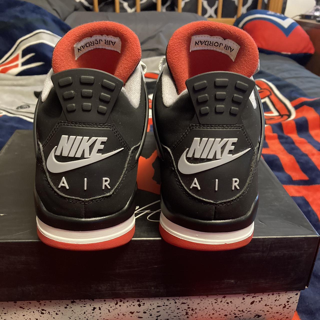 Real vs fake jordan 4 best sale bred 2019