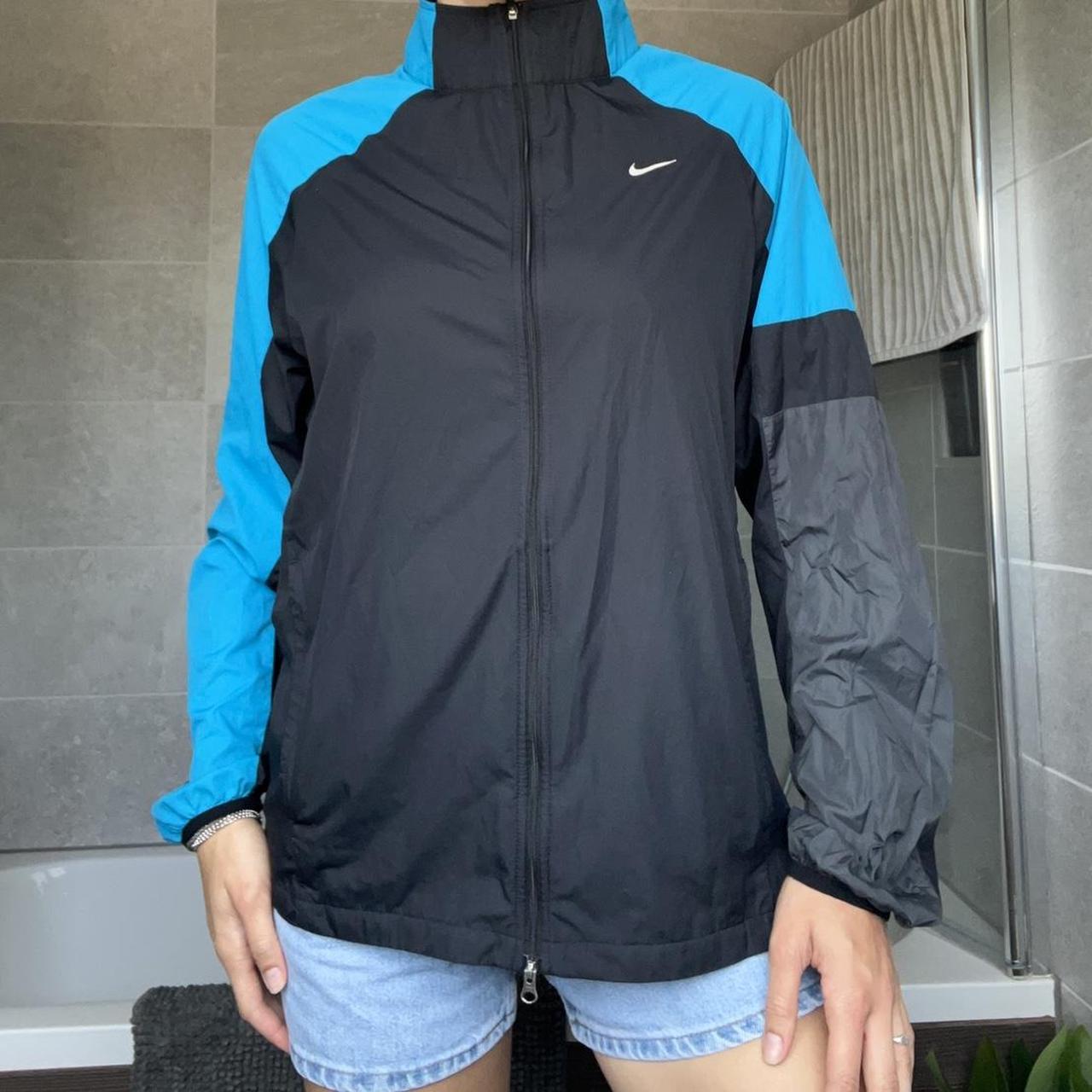 Black and blue nike windbreaker hotsell