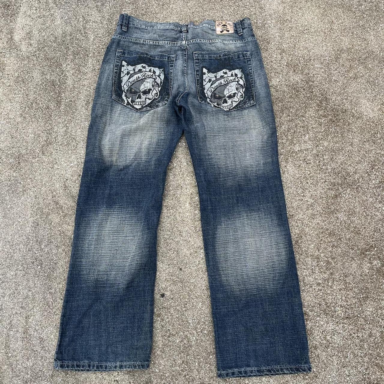 Insanely detailed bootcut baggy jeans with a skull... - Depop