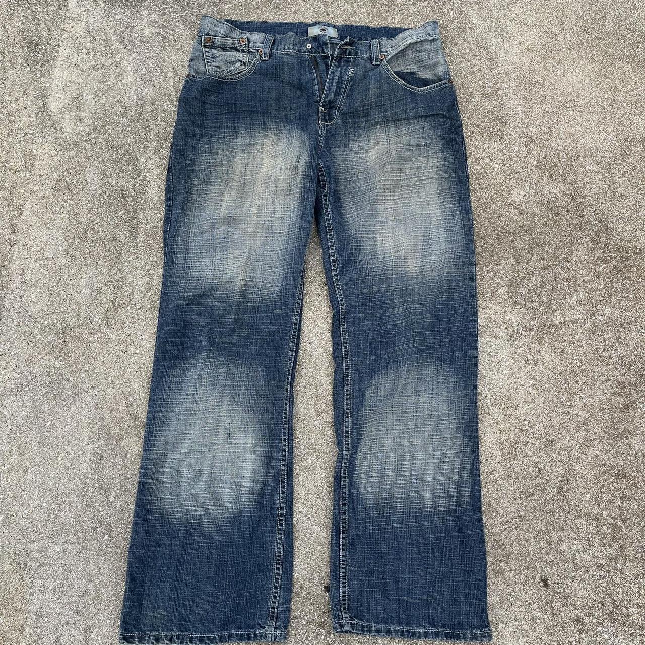 Insanely detailed bootcut baggy jeans with a skull... - Depop