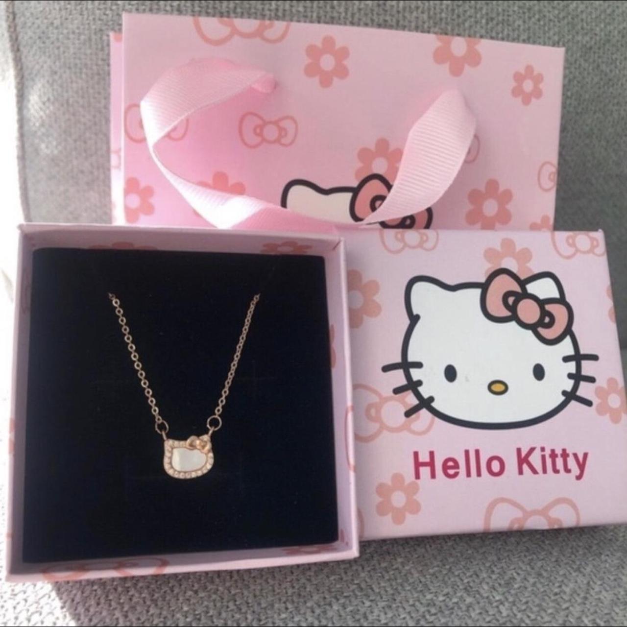 Hello Kitty rose gold necklace. Rose gold and... Depop