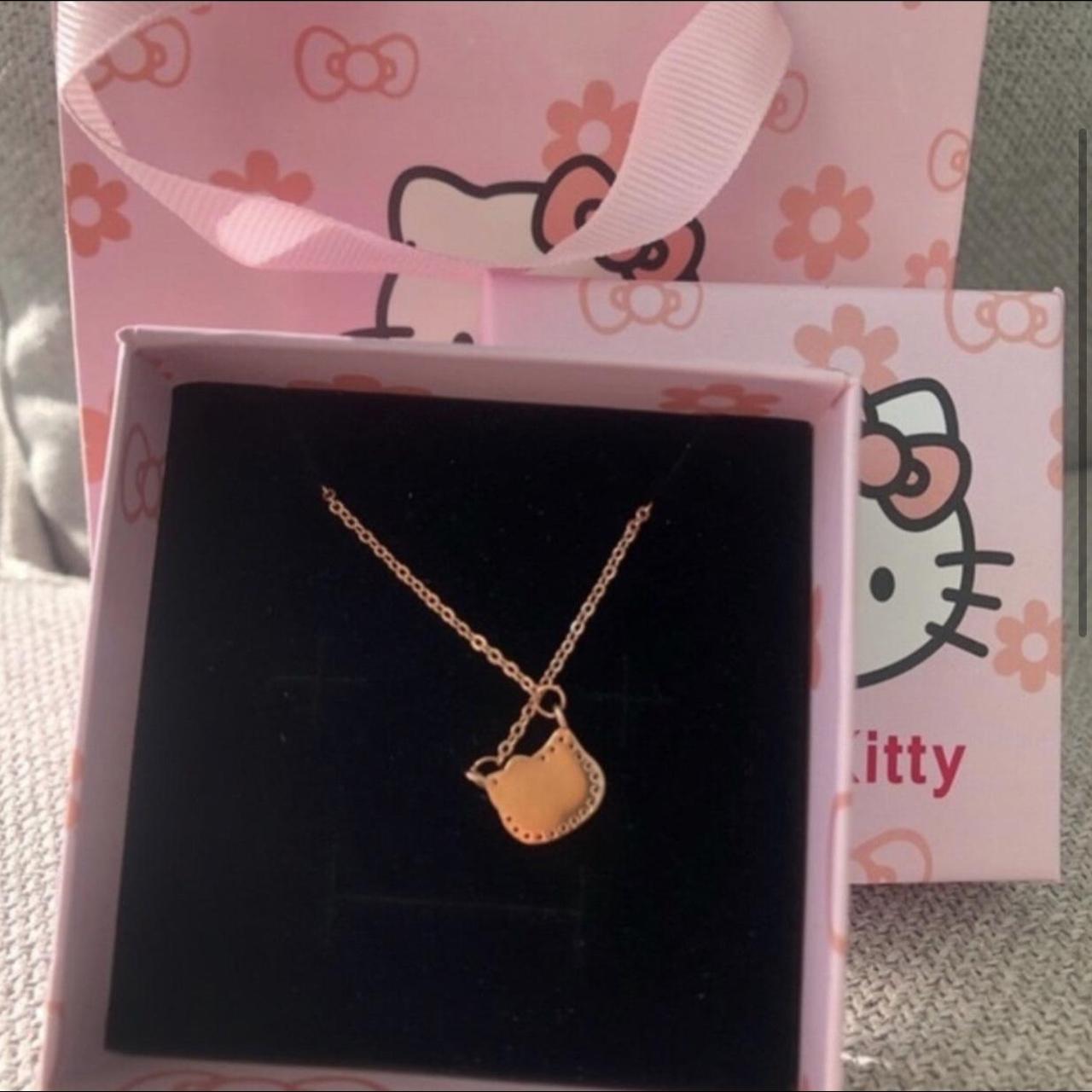 Hello Kitty rose gold necklace. Rose gold and... Depop