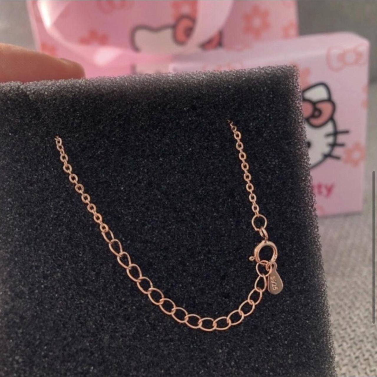 Hello Kitty rose gold necklace. Rose gold and... Depop