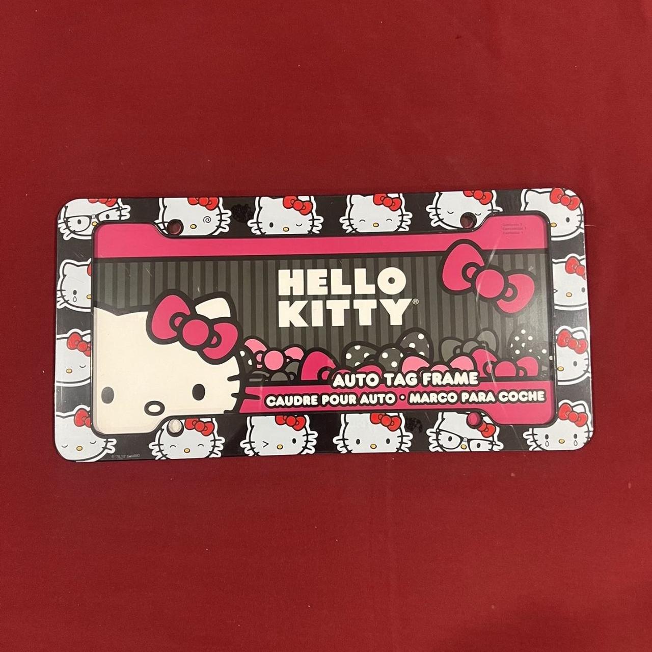 Hello kitty license plate cover new never opened... Depop