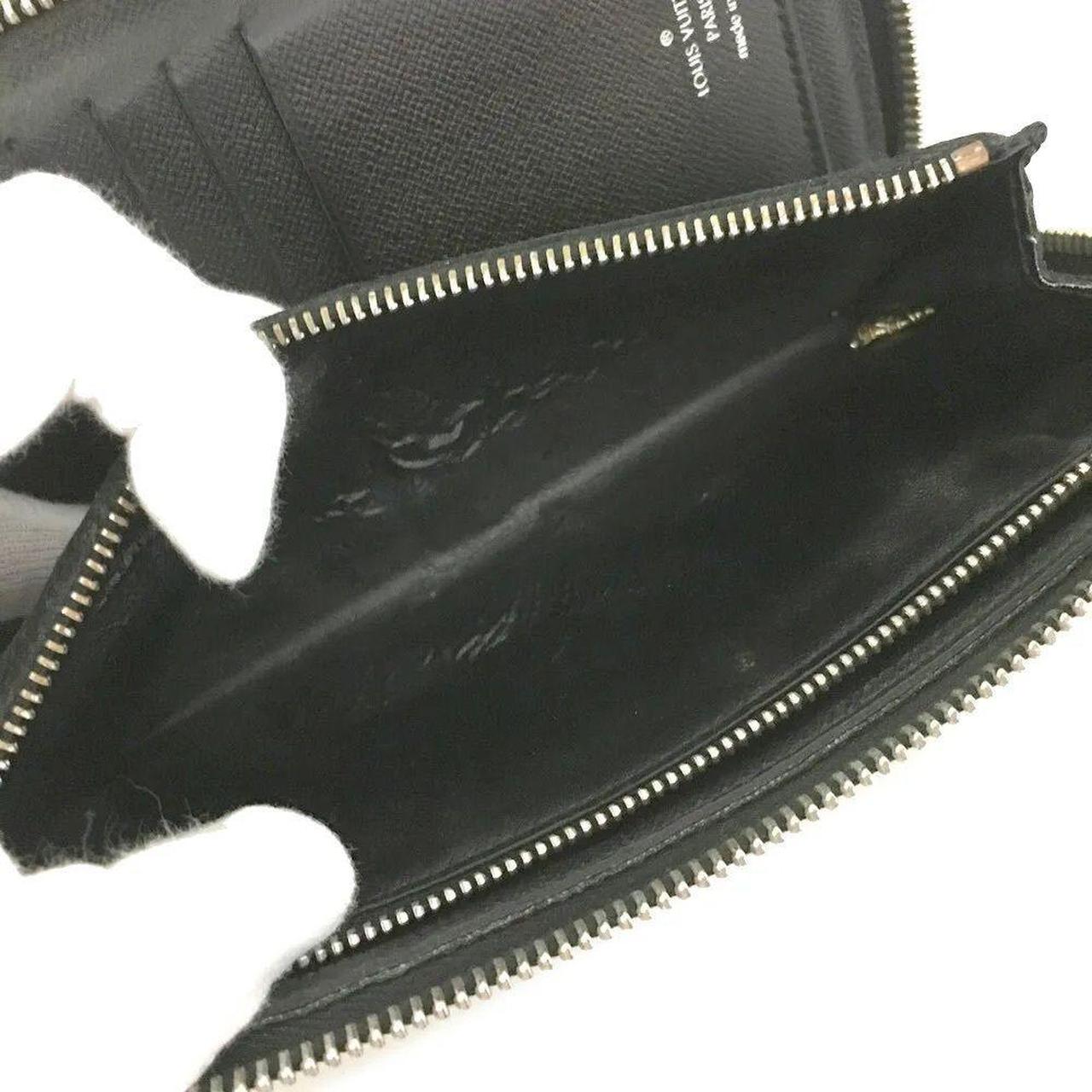 Louis Vuitton Zippy Wallet Vertical in Black Damier - Depop
