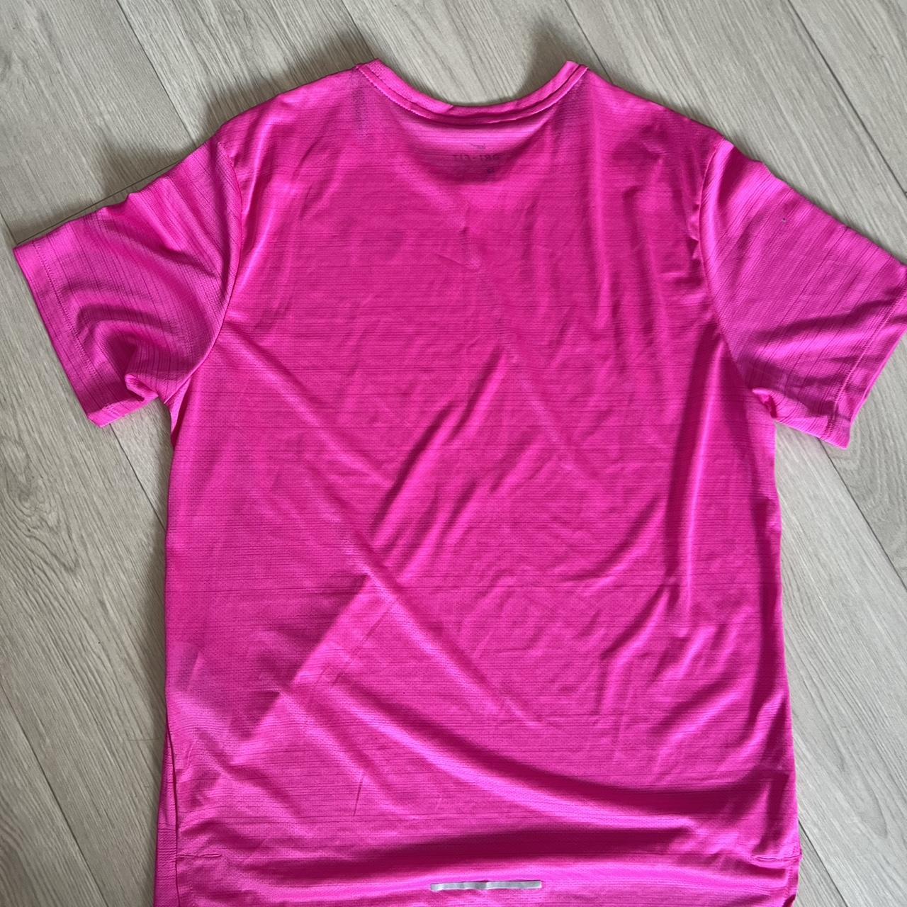 rust pink nike shirt
