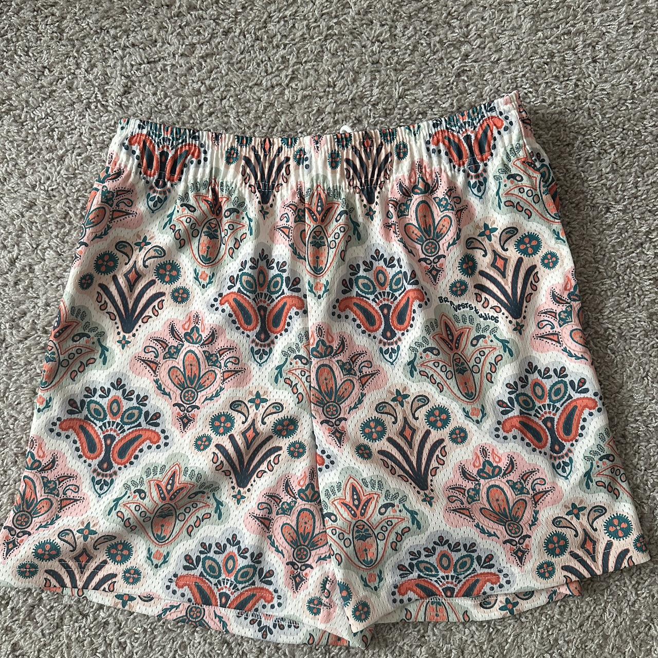 I have this LA LV bravest studios shorts in hands in - Depop