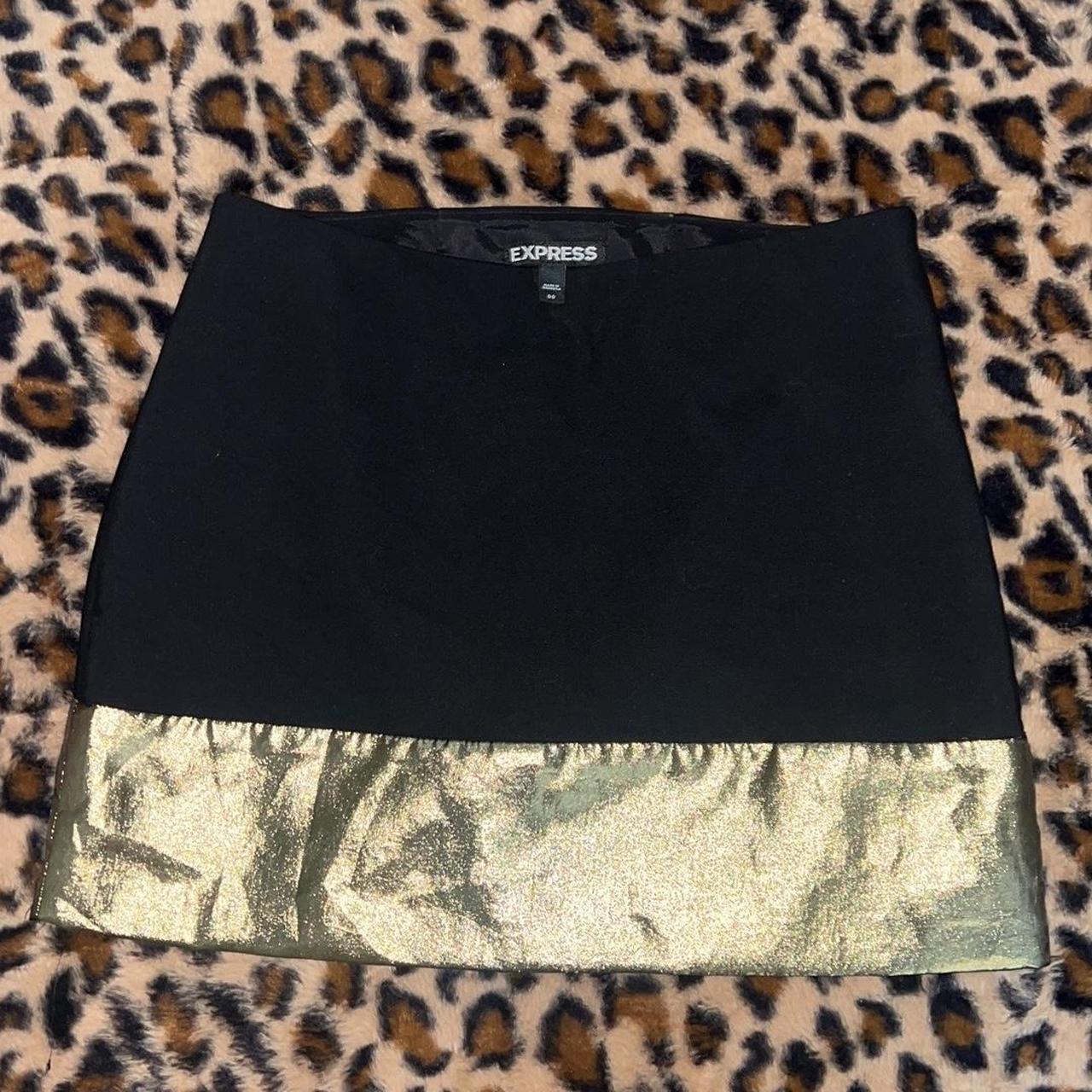 Express black and gold mini skirt Black zipper on. Depop