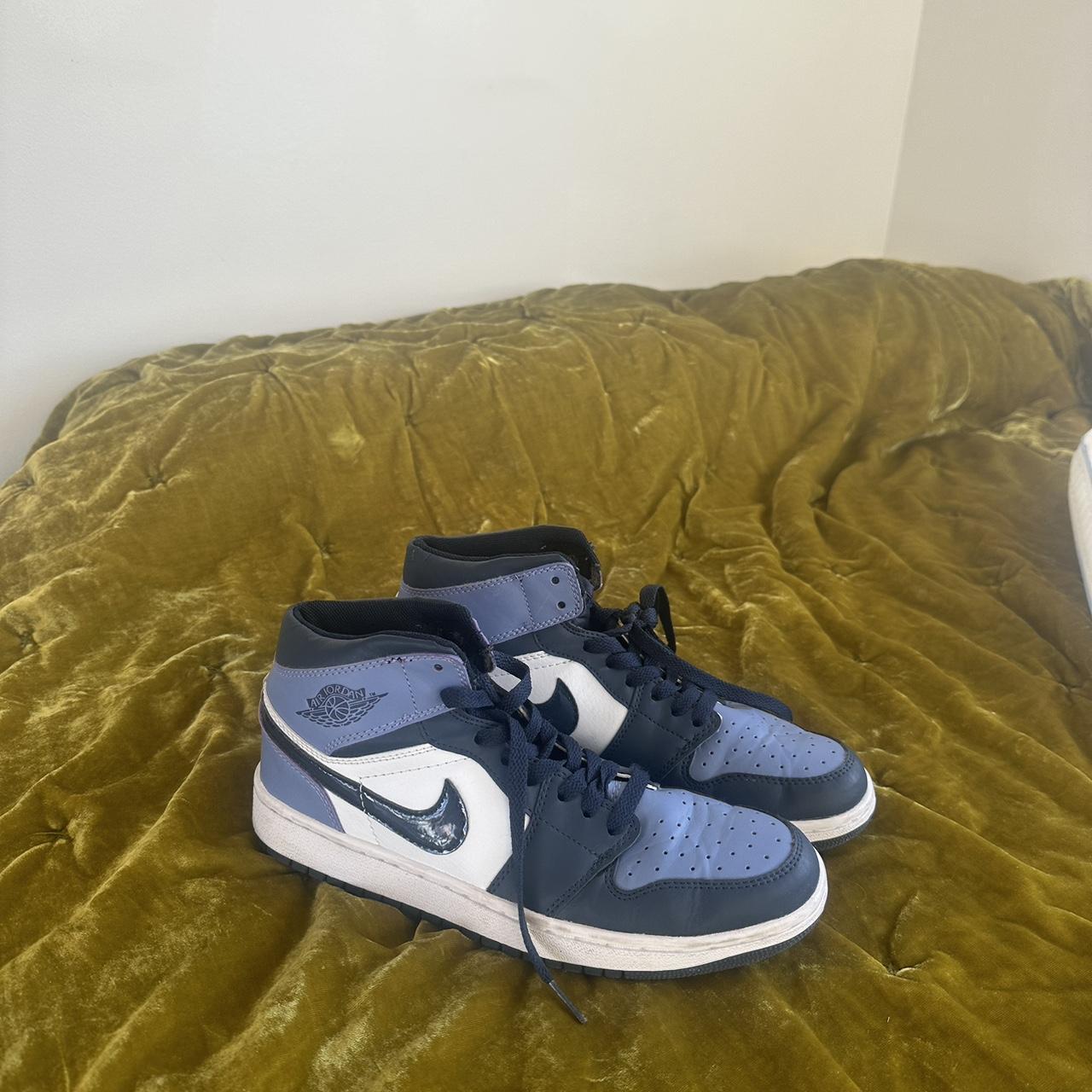 purple white and black nike shoes