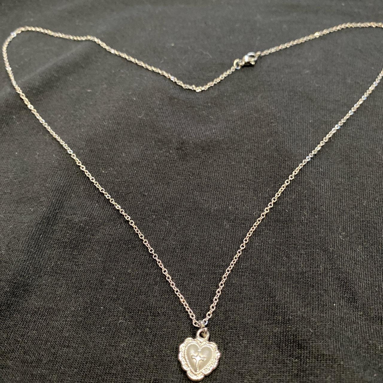 Love heart crucifix necklace Materials: stainless... - Depop