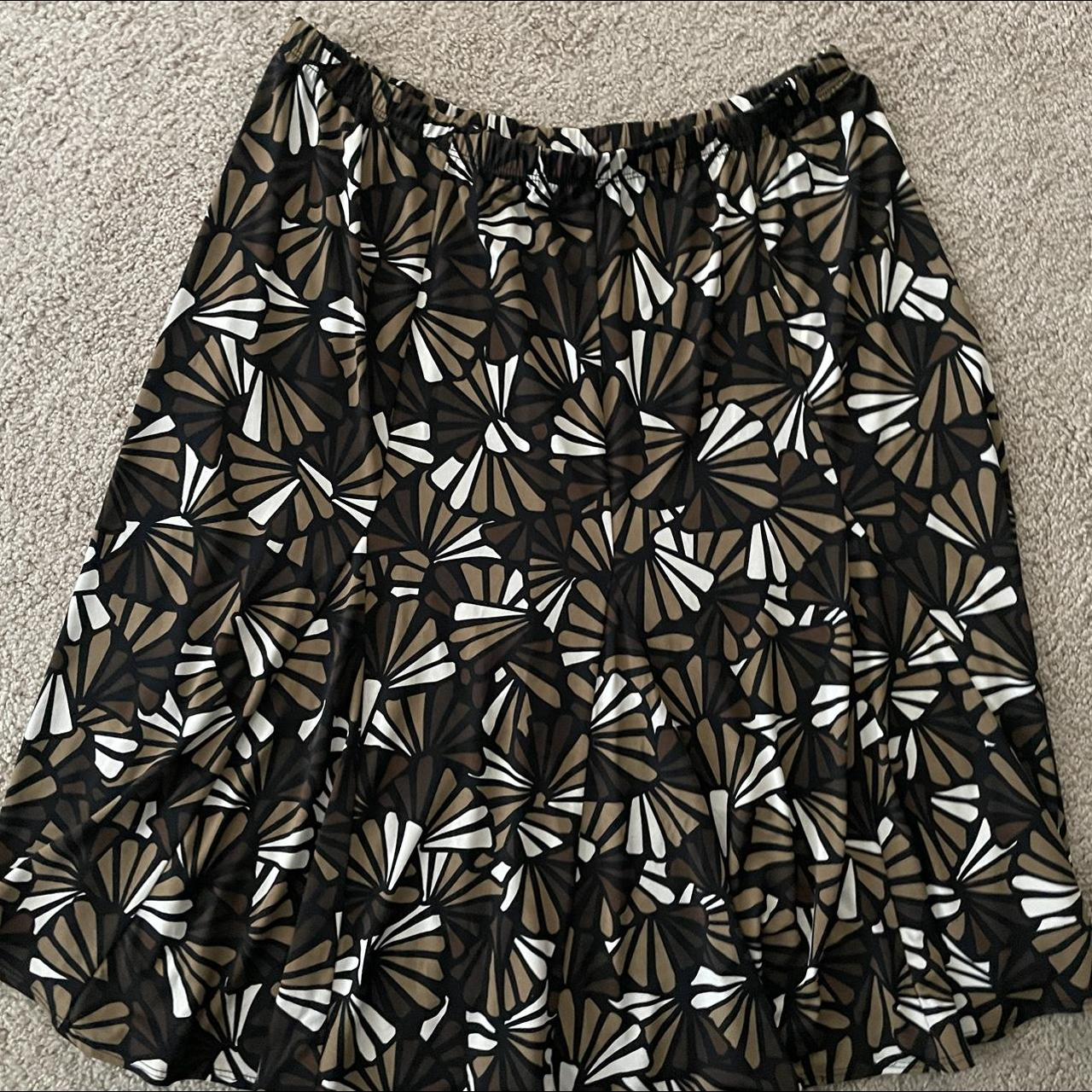 Super cute brown/white/black skirt, it gives almost... - Depop