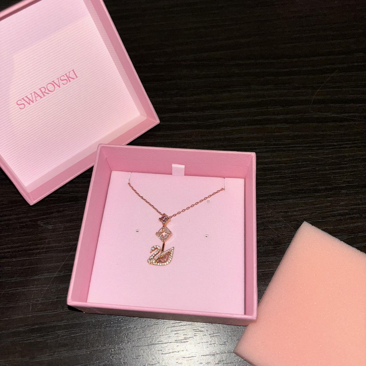 Swarovski dazzling swan necklace in pink I got Depop