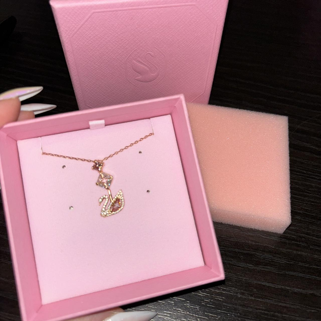 Swarovski dazzling swan necklace in pink I got this | Depop Swarovski dazzling swan necklace in pink I got this | Depop