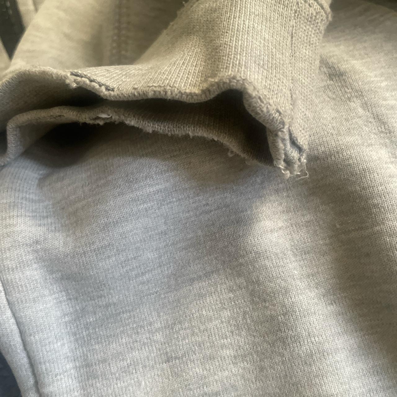 Old season grey nike tech hoodie some slight damages - Depop