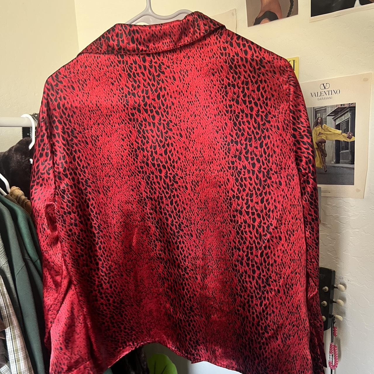 Red and black pattern silky button up top from... Depop