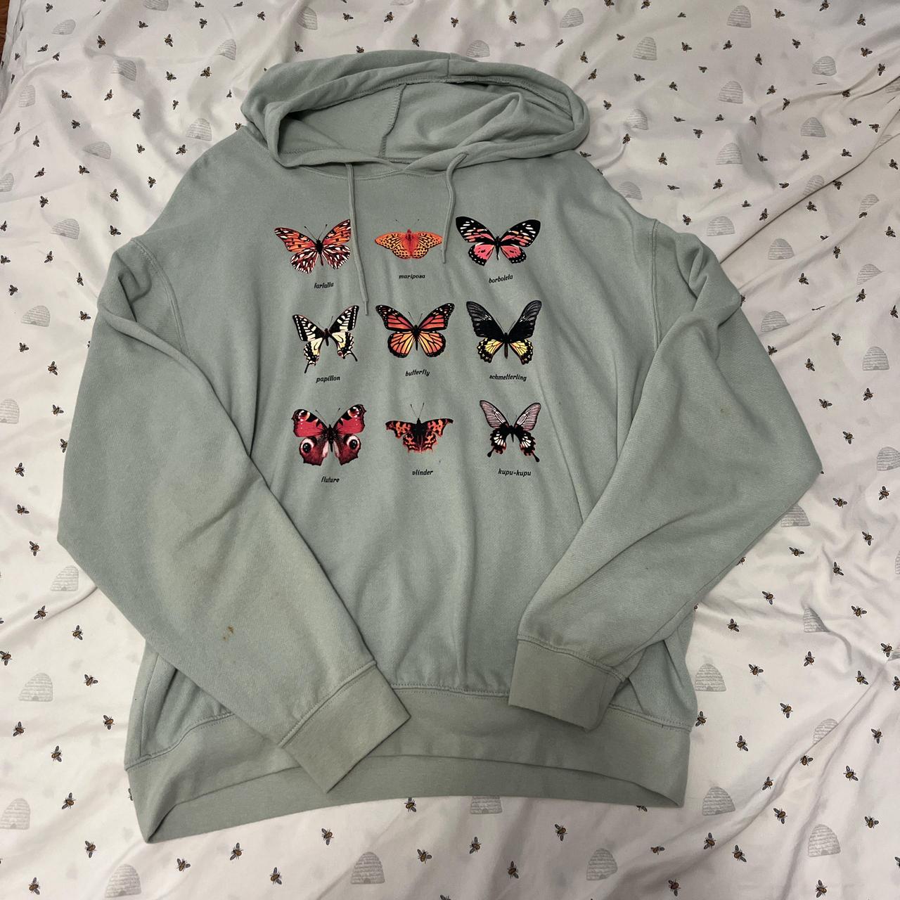 Light green butterfly hoodie size xl but can fit. Depop