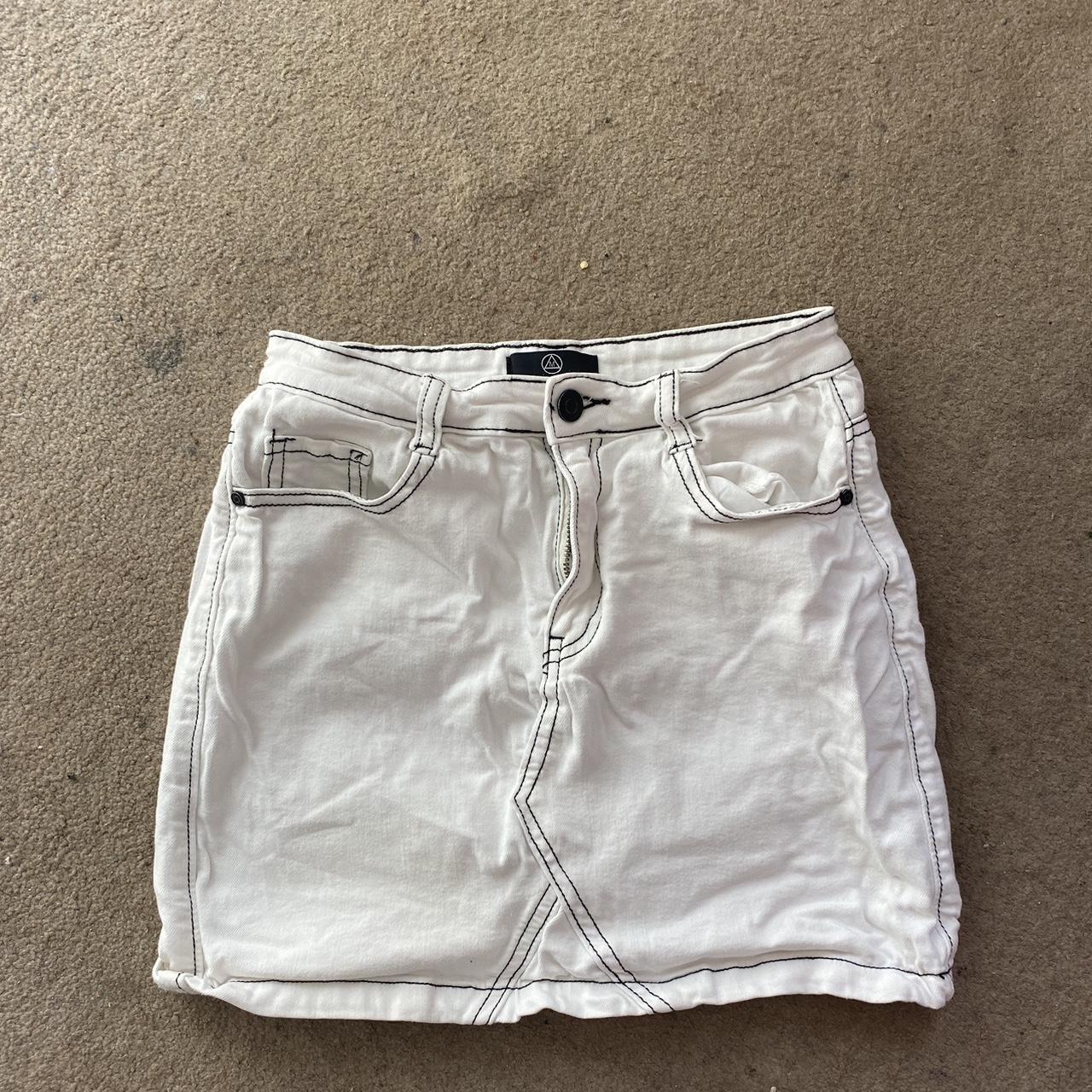 White and black contrast stitch mini skirt.... - Depop