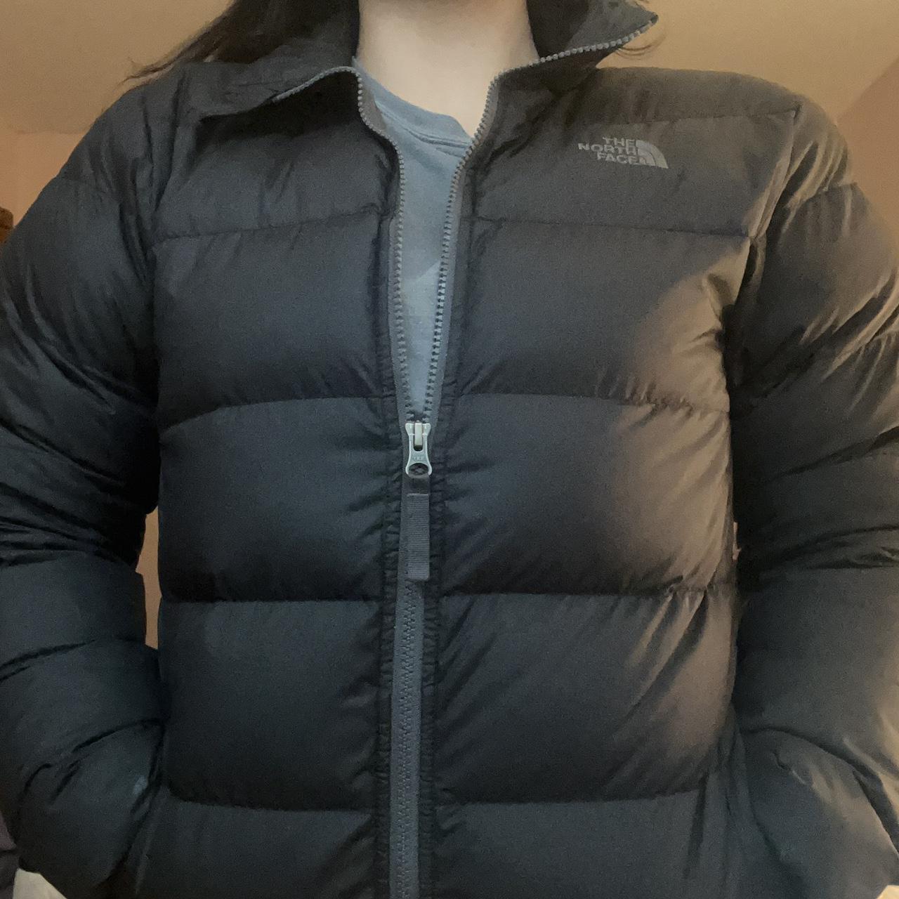 North Face black puffer jacket. Boys size XL but... - Depop