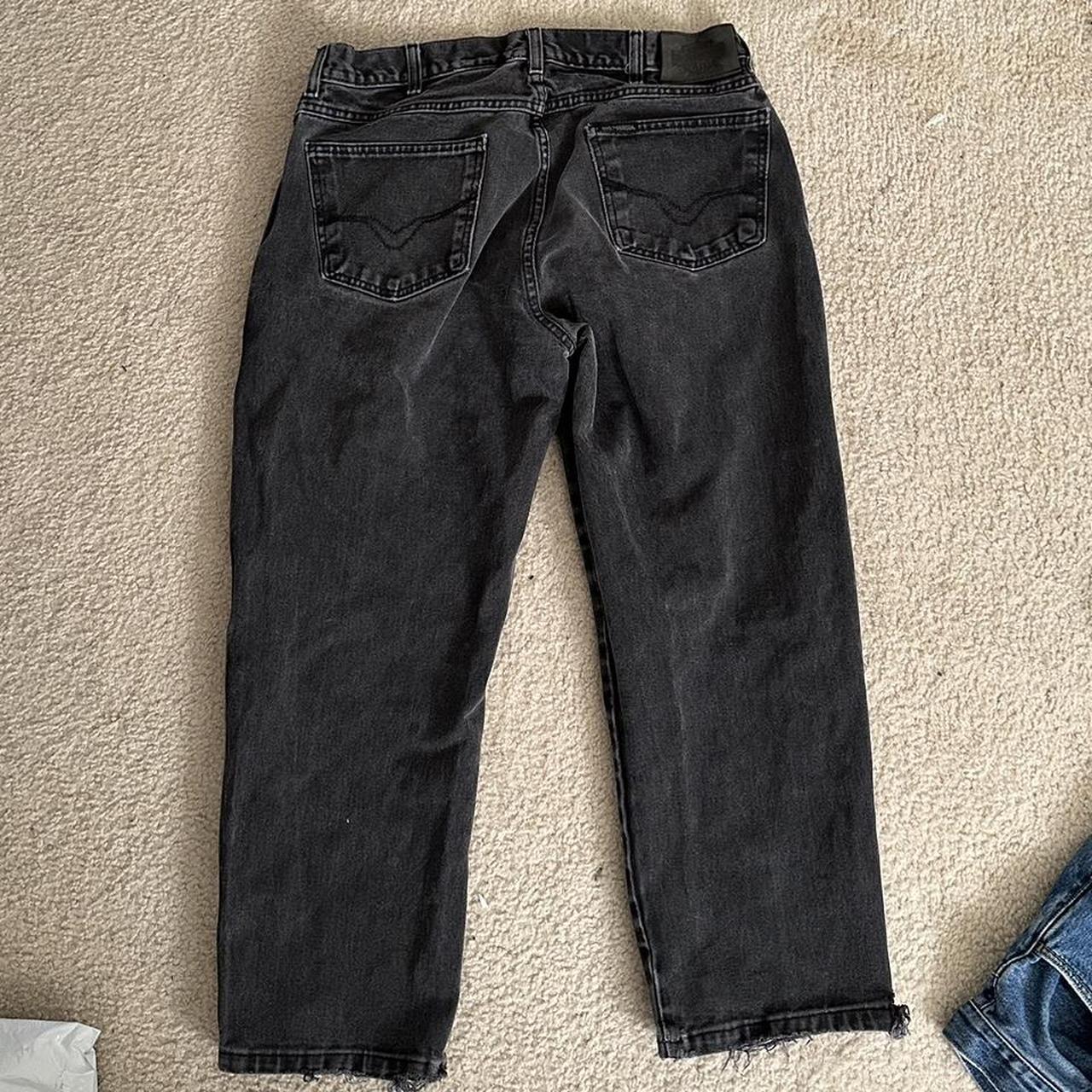 Black Harley Davidson jeans with some wear from... - Depop