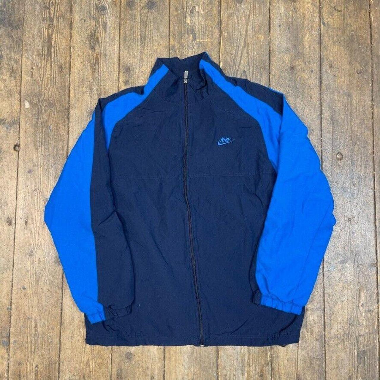 Royal blue nike hot sale track jacket