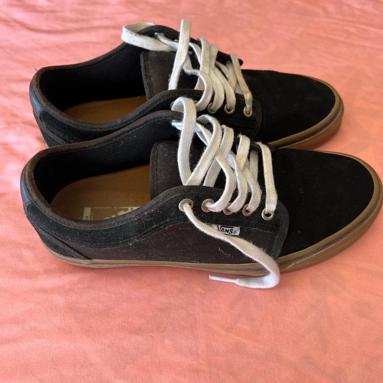 Black vans on sale with brown trim