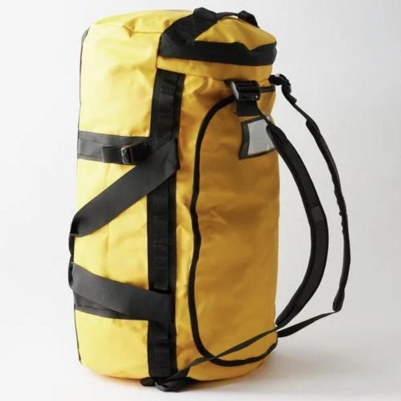 Large yellow north face duffel bag Depop