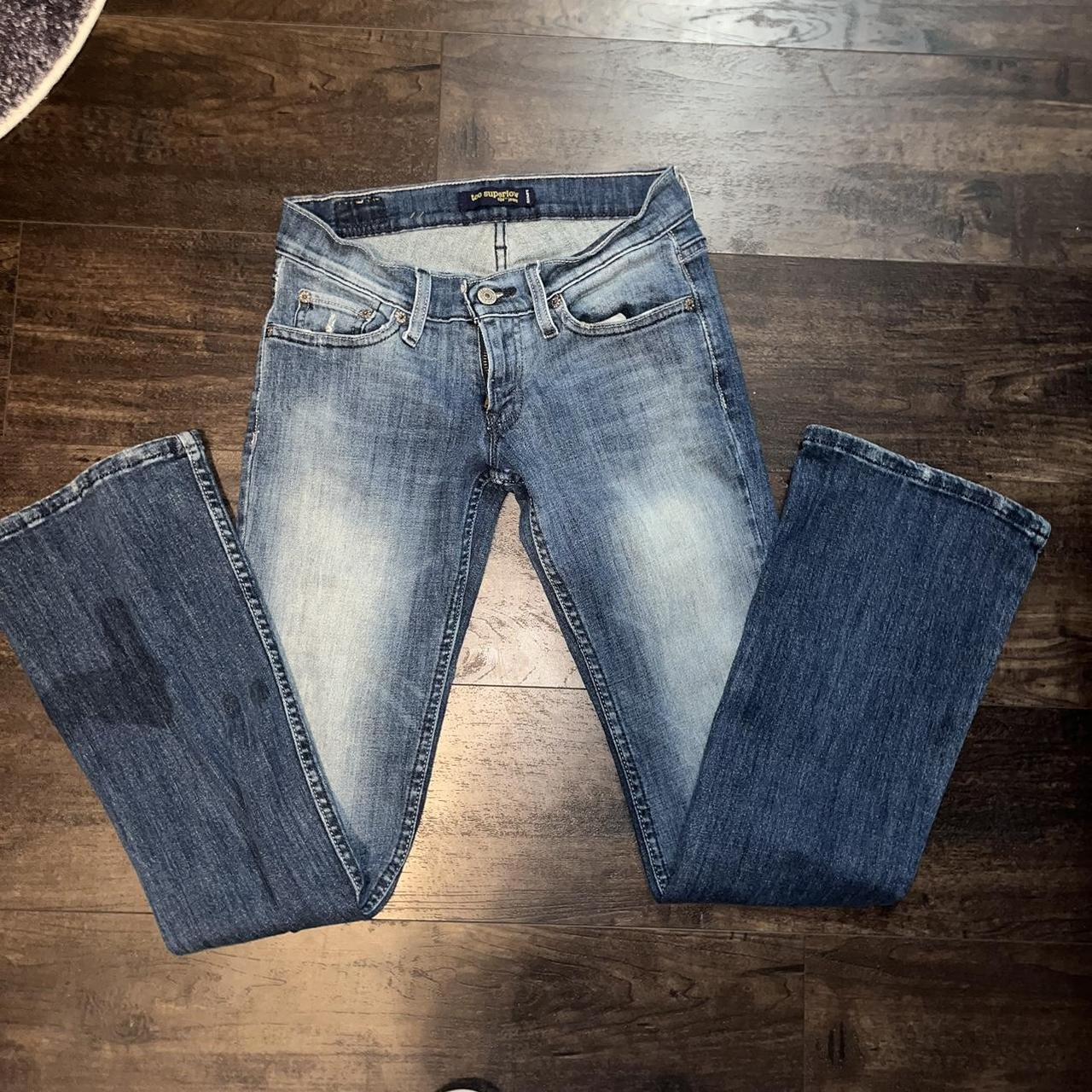 low rise levi flare jeans stains on the... - Depop