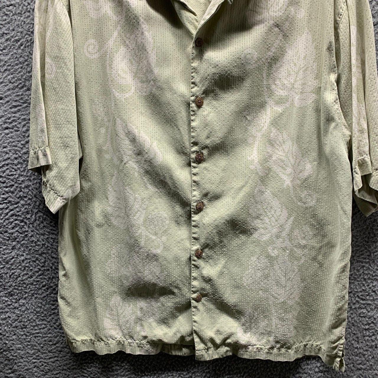 Vintage Tommy Bahama shirt. Black stain on the back, - Depop