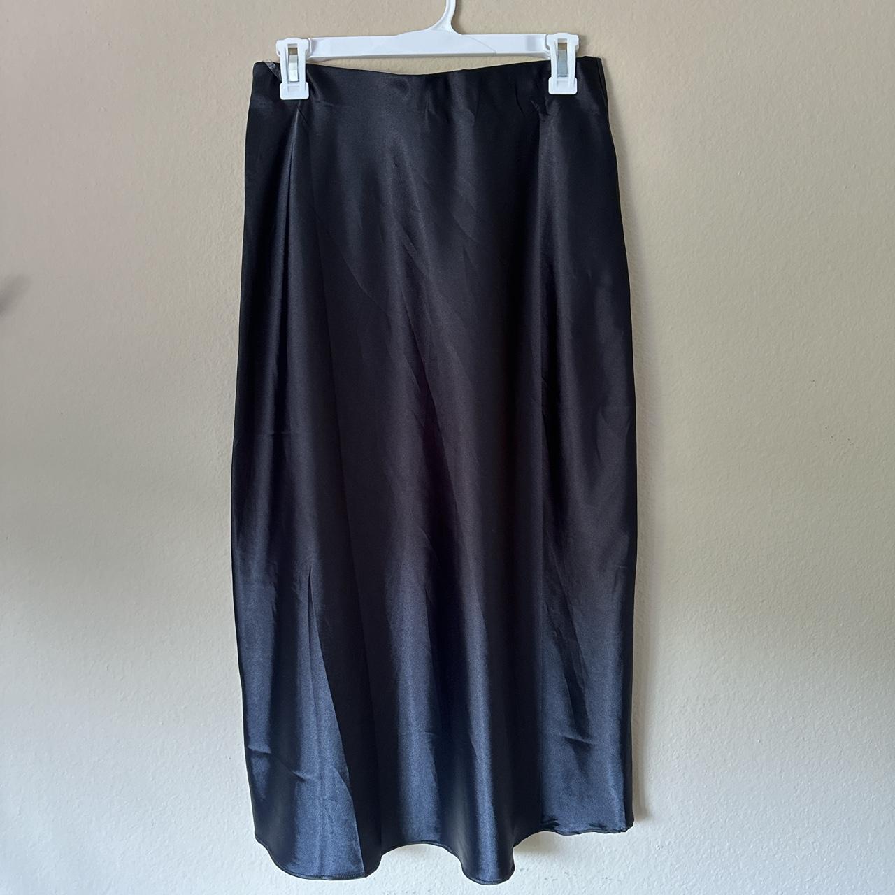 Vintage black silk skirt! Im size 8/10 and it fits... - Depop