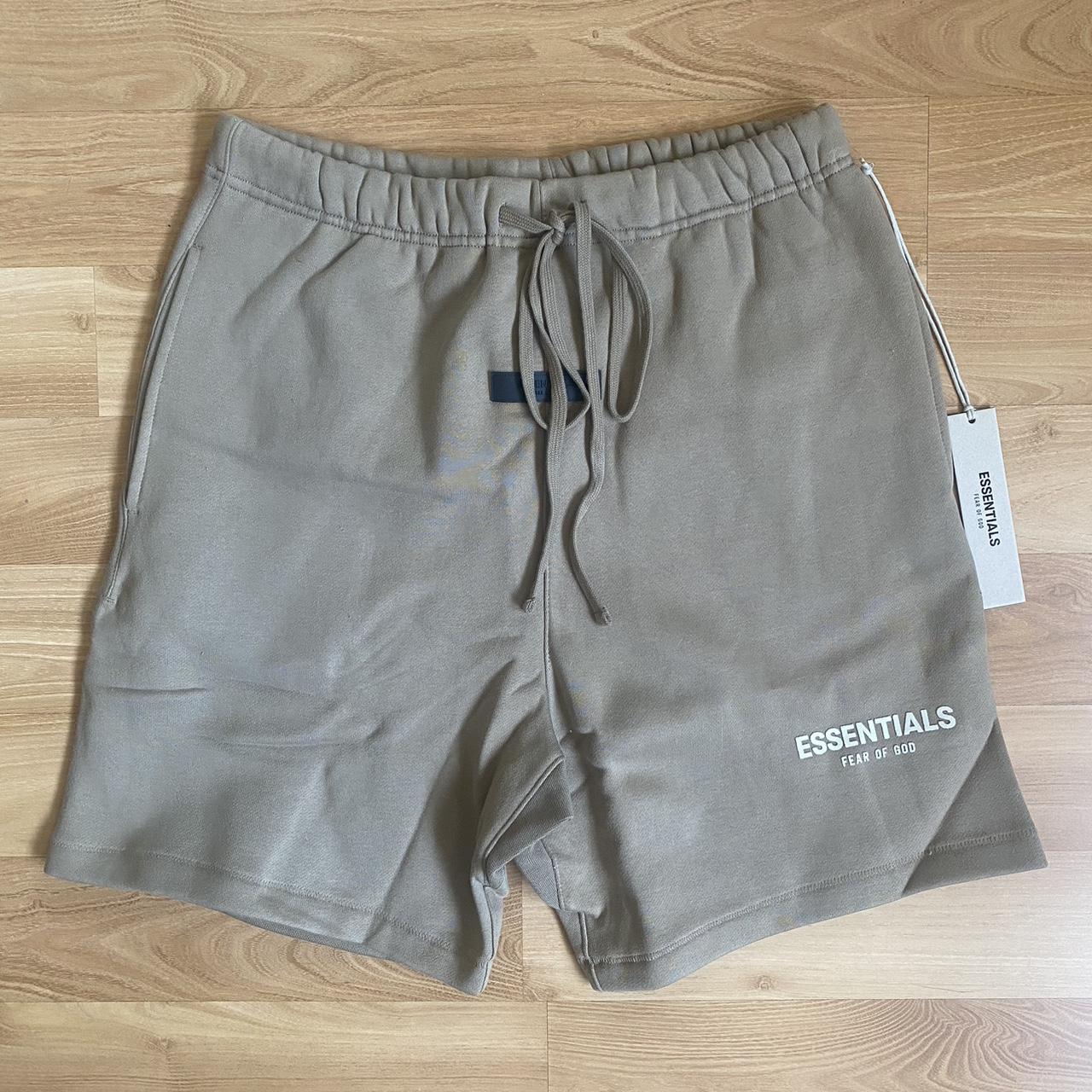 Fear of God Essentials Shorts (Oak) Size... - Depop